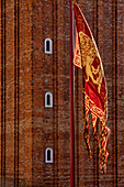 Venetian flag in front of the Campanile di San Marco, Venice, Veneto, Italy