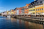 Colorful houses, restaurants and historic ships at Nyhavn Canal and Harbour, Copenhagen, Denmark, Europe
