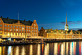 The former stock exchange Børsen and CF Tietgens Hus on the Holmens Canal at dusk, Copenhagen, Denmark, Europe