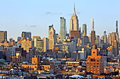 View from the Lower East Side of the Midtown skyline with the Empire State Building, Manhattan, New York, New York, USA