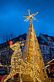 Illuminated reindeer and pyramid at a Christmas market in Copenhagen, Denmark