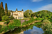 Castle of Chateau de Cabezac, on the Canal du Midi, UNESCO World Heritage Canal du Midi, Occitania, France