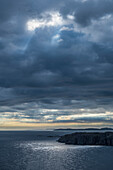 Canada, Labrador, Newfoundland, Twillingate, Dramatic seascape view on cloudy sunrise