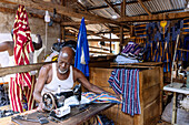 Tailoring of traditional Dagomba smocks at the Central Market in Tamale in the Northern Region of northern Ghana in West Africa