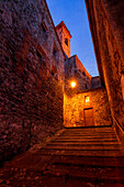 View up to the Baptistery of St. Galgano in Chiusdino at night, Province of Siena, Tuscany, Italy