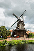 Canal with windmill, Westgrossefehn, Großefehn, East Friesland, Lower Saxony, Germany