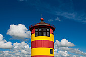 Yellow-red lighthouse, Pilsum lighthouse, Pilsum, Krummhörn, East Frisia, Lower Saxony, North Sea, Germany