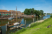 Old harbor with warehouses, Hooksiel, Wangerland, East Frisia, Lower Saxony, North Sea, Germany