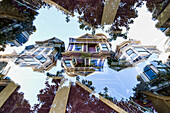 Double exposure of a Victorian style colorful wooden residential building on Hayes street in San Francisco, California.