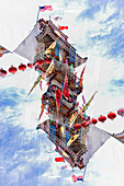 Double exposure of a Eastern style building decorated with Chinese Lanterns on Grant Avenue in Chinatown, San Francisco.