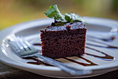 Slice of chocolate cake served at Plantation Belmont Estate restaurant, Saint Patrick, Grenada, Caribbean