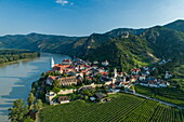 Aerial view of the picturesque town of Dürnstein along the Danube with Burgruine Dürnstein castle ruins, Dürnstein, Wachau, Lower Austria, Austria, Europe