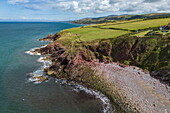 Aerial view of rocky beach and coastline, Peel, Isle of Man, British Crown Dependency, Europe