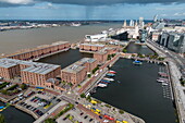 Aerial view of the Royal Albert Dock area with the World Voyager (nicko cruises) expedition cruise ship at Liverpool Cruise Terminal, Liverpool, England, United Kingdom, Europe