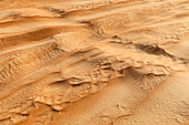 The wind forms artistic sand structures in the Wahiba Sands desert, Sultanate of Oman