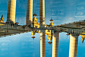 Double exposure photograph of the four columns statue on the Plaça de Josep Puig i Cadafalch near the Font Majica in Barcelona