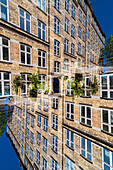 Double exposure of the facade of a large housing complex at Webersgade in copenhagen, Denmark.