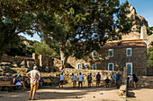 Boules player, Ermitage de la Trinité, Bonifacio, South Coast, Corse-du-Sud Department, Corsica, Mediterranean Sea, France
