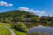 Aerial view of a couple on e-bike bicycles on the banks of the Main with Wertheim Castle in the distance, Kreuzwertheim, Spessart-Mainland, Franconia, Bavaria, Germany, Europe