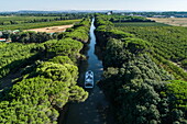 Aerial view of a Le Boat Horizon 5 houseboat on the Canal du Midi, Sallèles-d&#39;Aude, Aude, France, Europe