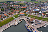 Aerial view of fishing boats in the harbor and town, Oudeschild, Texel, West Frisian Islands, Friesland, The Netherlands, Europe