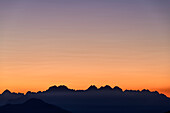 Silhouette with Monte Crissin at dawn, from Monte Punta, Dolomites, Veneto, Veneto, Italy