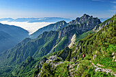 Two people hiking on the ridge path, Feltriner Berge, Belluneser Höhenweg, Dolomites, Veneto, Venetia, Italy