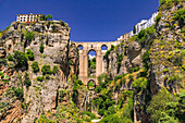 The picturesque town of Ronda with the Puente Nuevo spectacularly bridging the gorge in the town, Andalusia, Spain