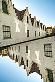 Double exposure of the old nunnery houses in Bruges, Belgium.