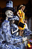 Skull figures made of porcelain in a shop window, Mérida, capital of Yucatán, Mexico, North America, Latin America