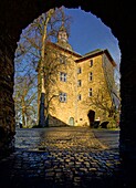 Upper Castle in Siegen in the evening light, view through the arch of the main entrance, Siegen, North Rhine-Westphalia, Germany