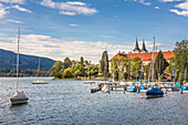 Boat harbor in Tegernsee, in the background Tegernsee Monastery, Upper Bavaria, Bavaria, Germany