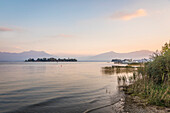 Evening mood on the shore of Lake Chiemsee with Fraueninsel near Gstadt am Chiemsee, Upper Bavaria, Bavaria, Germany