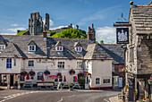 Village street in Corfe Castle, Dorset, England