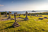 Old Marazion Cemetery and view of St Michael`s Mount, Cornwall, England