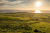 Evening light on the west coast of the Trotternish Peninsula north Uig, Isle of Skye, Highlands, Scotland, UK