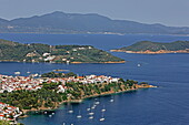 View of Skiathos town and Skiathos offshore islands, in the background Skopelos, Northern Sporades, Greece