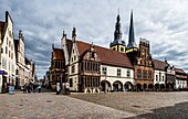 Town hall in the style of the Weser Renaissance, in the background the church of St. Nicolai, town houses in Mittelstraße, Lemgo, North Rhine-Westphalia; Germany