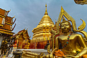 Buddha statue and golden chedi of the Buddhist temple complex Wat Phra That Doi Suthep, landmark of Chiang Mai, Thailand, Asia