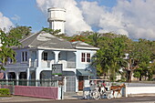 Horse drawn carriage in front of a house on East Street in Nassau, Island of New Providence, The Bahamas