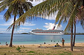 Cruise ship departing the Nassau terminal, seen from Junkanoo Beach, Nassau, New Providence Island, The Bahamas