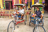 Bicycle rickshaw drivers waiting for customers, Chiang Mai, Thailand, Asia