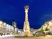Main square with Trinity Column and Old Cathedral in Linz in Oberösterreich in Austria