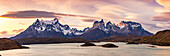 The Torres del Paine mountain massif at dusk and sunset at Lake Pehoe, Torres del Paine National Park, Chile, Patagonia, South America