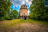 The Bismark Tower in Jena am Forst in the forest with a blue sky and veil clouds, Jena Thuringia, Germany