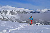 Woman on ski tour ascending to Schönbichl, Schönbichl, Gerlos, Zillertal Alps, Tyrol, Austria