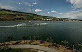 View over the Rhine promenade from Bingen to a hotel ship on the Rhine, in the background the Niederwald and the old town of Rüdesheim, Upper Middle Rhine Valley, Rhineland-Palatinate/Hesse, Germany
