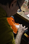 Lutist Philippe Devanneaux at work in his shop, Cremona, Italy