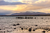 Evening mood with clouds at the old jetty of Puerto Natales on the Ultima Esperanza Fjord in southern Chile, Patagonia, South America