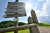 St. Kathrein Church with hiking trail sign near Avelengo via Meran, Adige Valley, South Tyrol, Italy